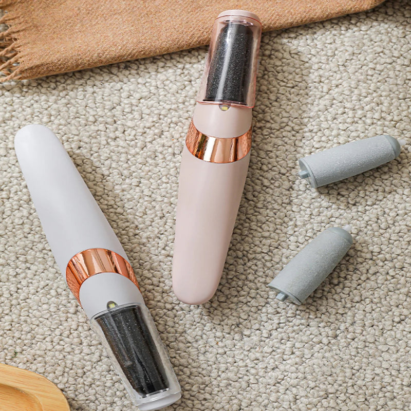 Handheld electric foot scrubber with replaceable grinding heads